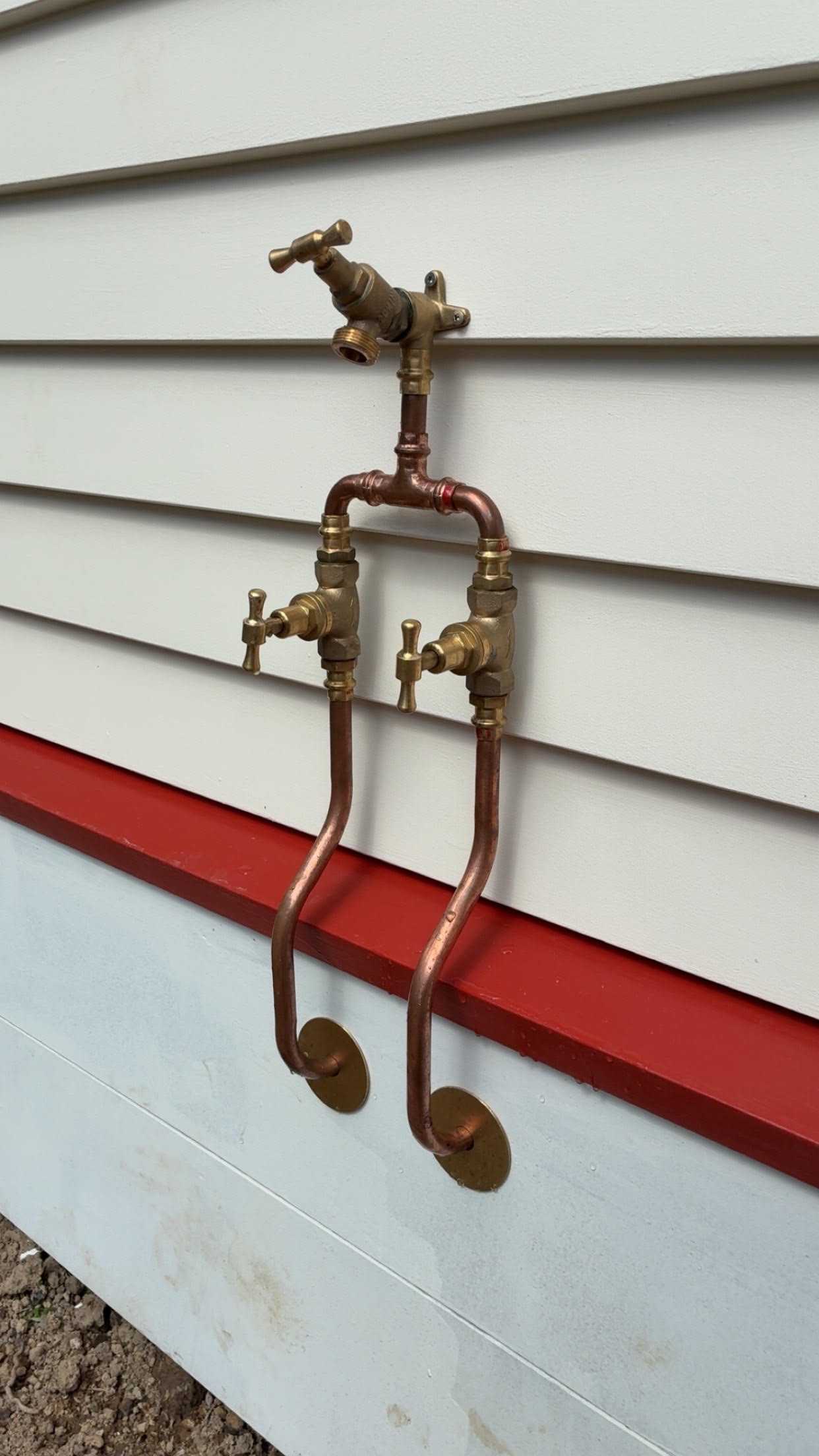 An outdoor hot / cold hose for washing the dog or giving the kids warm water for their outdoor entertainment.