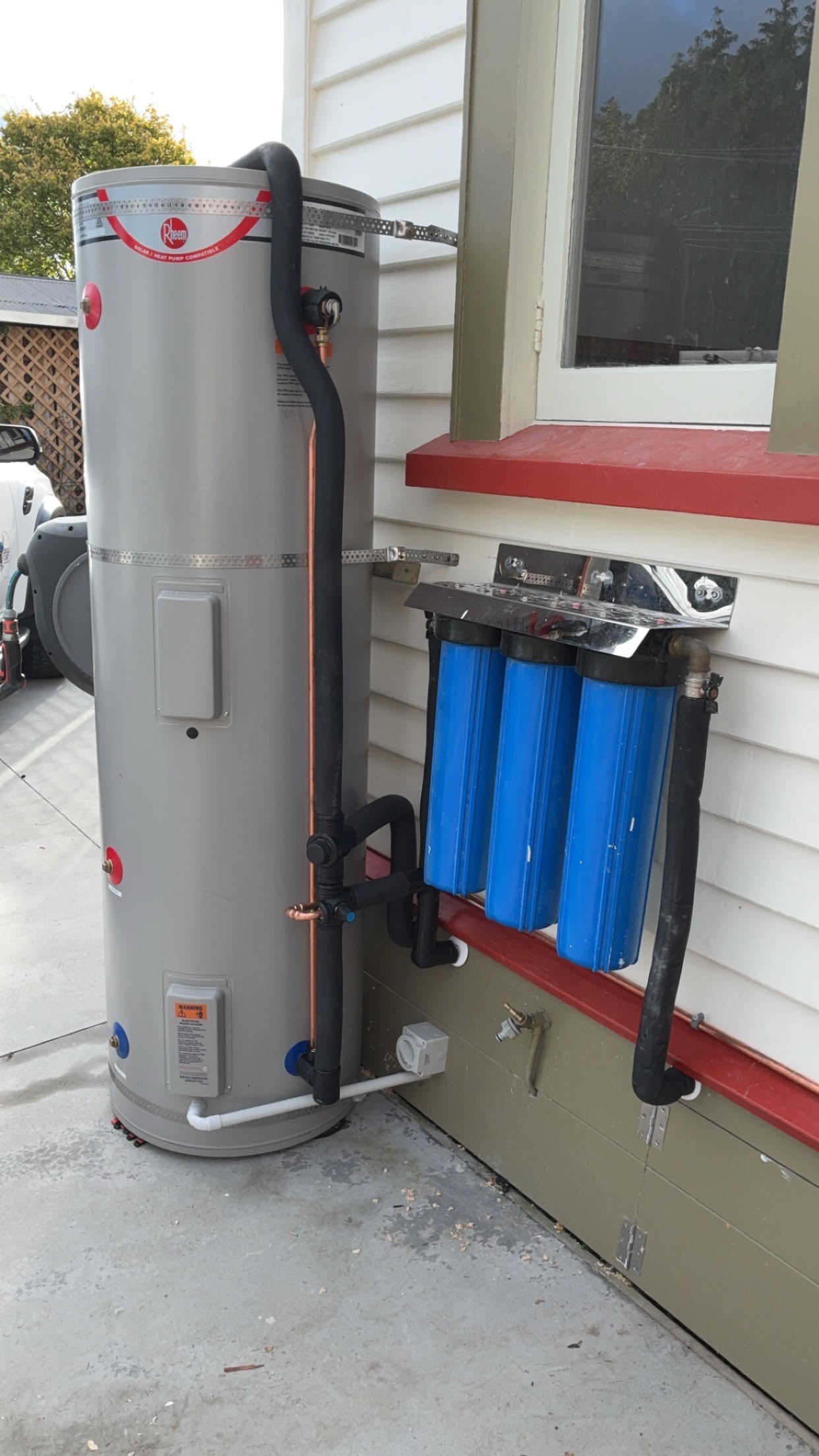 A 300L hot water cylinder with a whole house water filter system designed to remove sediment to protect tapware, remove taste an odour from the water and also to remove chemicals that aggregate skin conditions like Eczema.